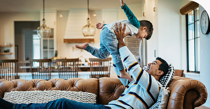 a-father-playfully-lifting-his-son-into-the-air_Ratio16-9